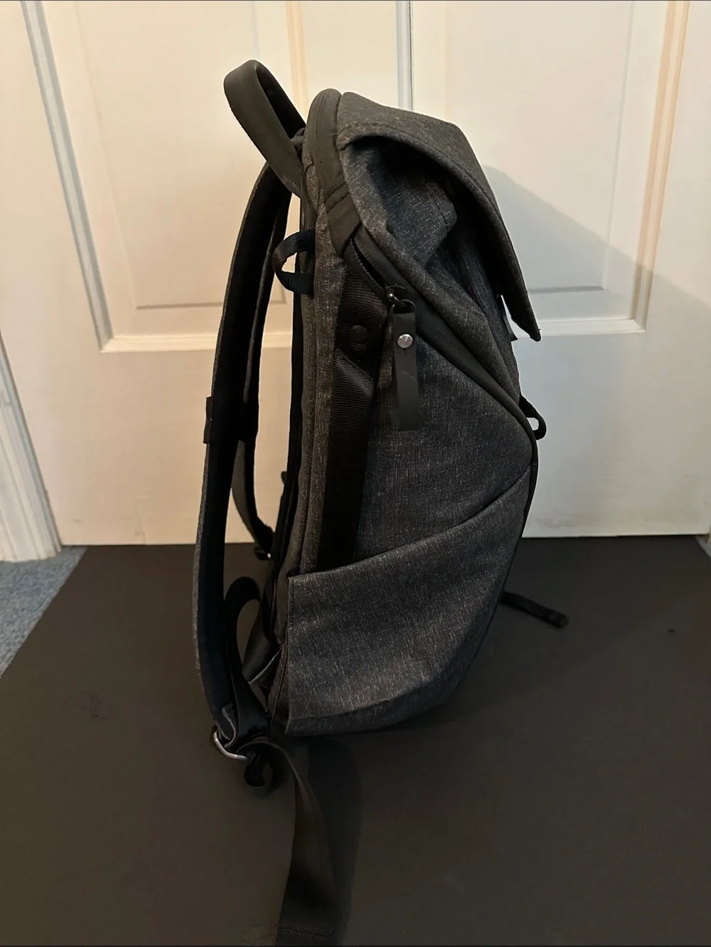 Peak Design Dark Gray Everyday Backpack with Red Accent.